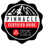 Badge showing “Pinnacle Certified Guide 2025” with mountain illustration and red/black design